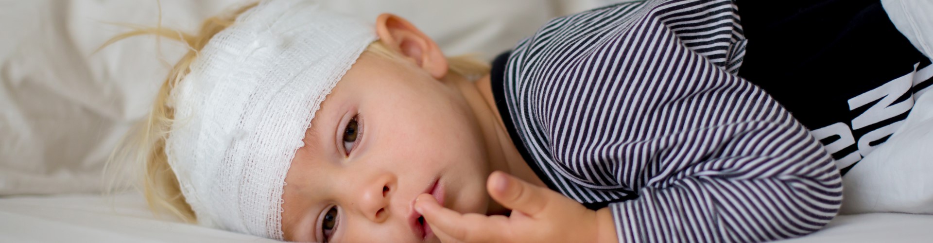 Rough or inappropriate handling of an infant